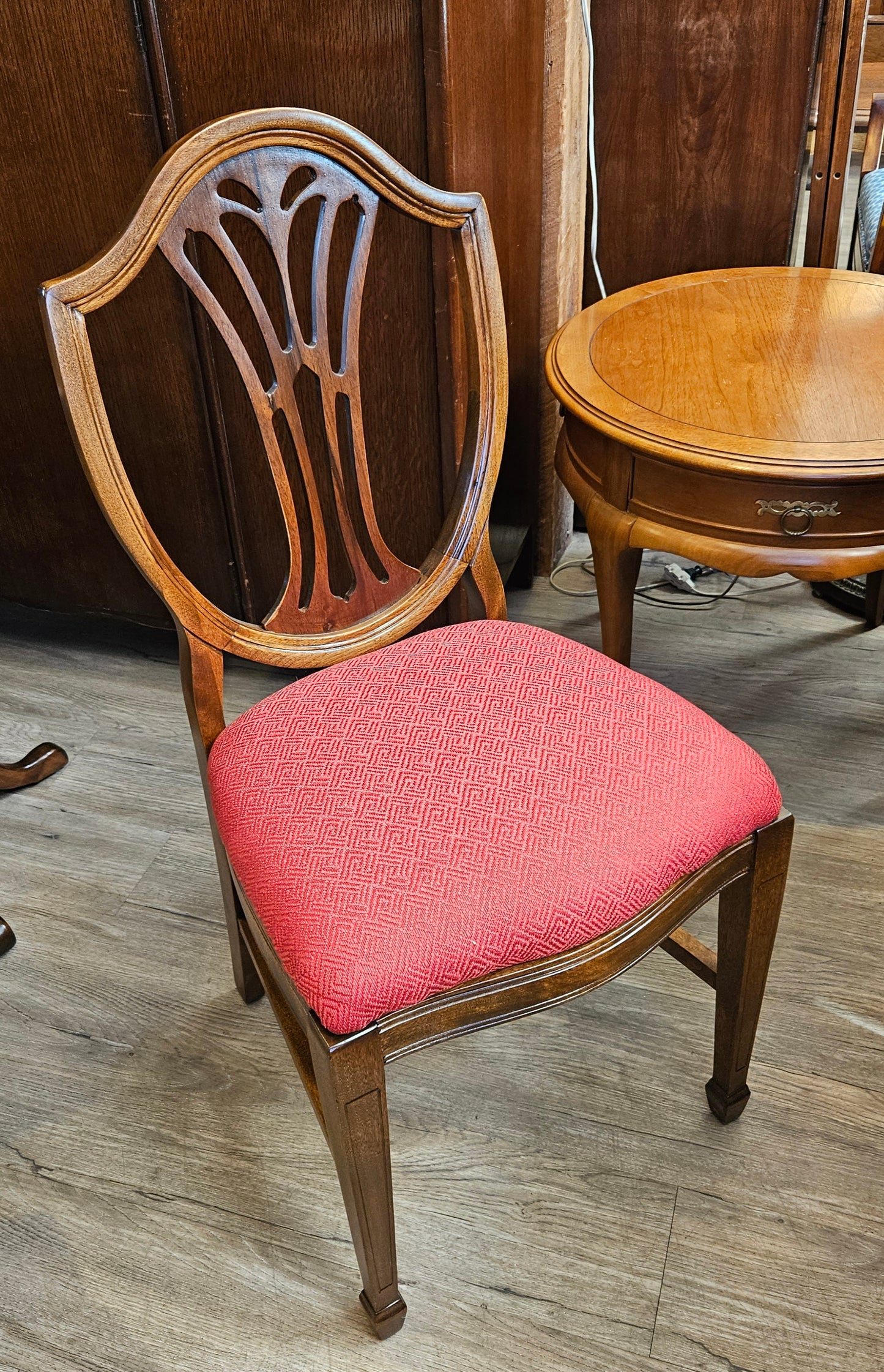 Pink/red upholstered shield chair