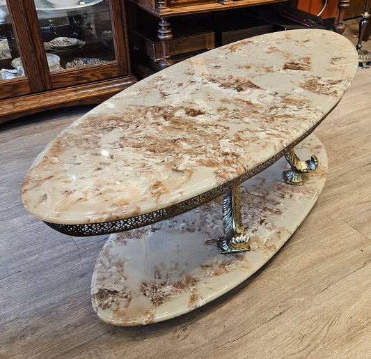 Oval coffee table, cultured marble and brass