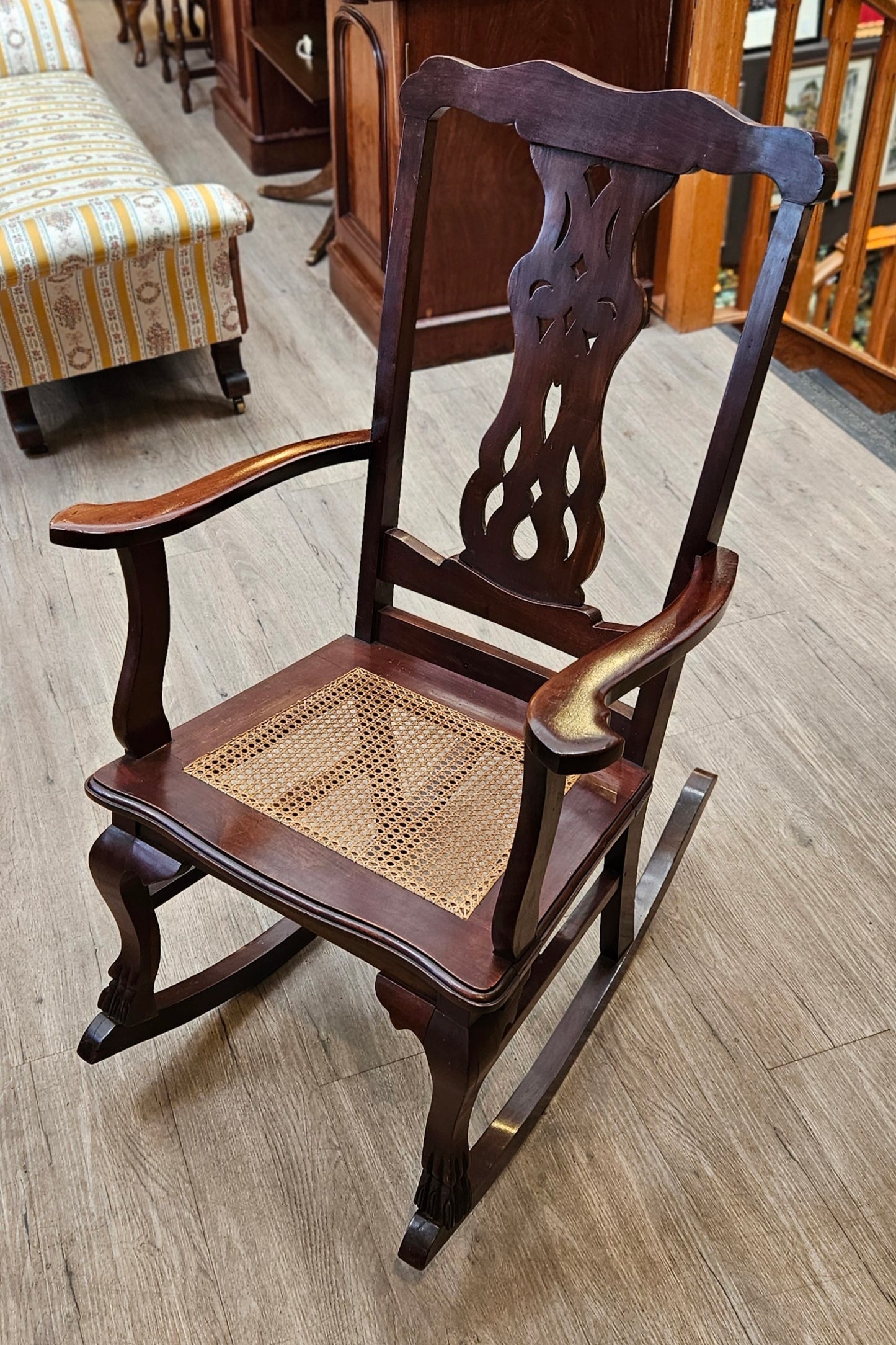 Rocking chair, caned seat, spindle back