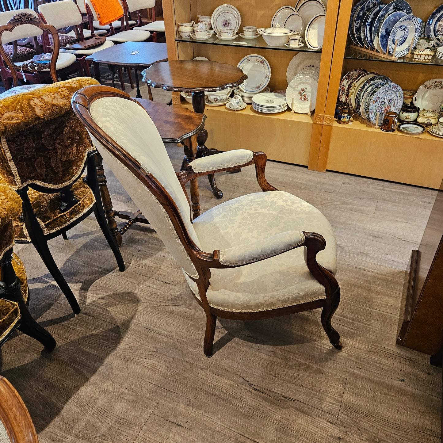 Victorian armchair, cream coloured upholstery