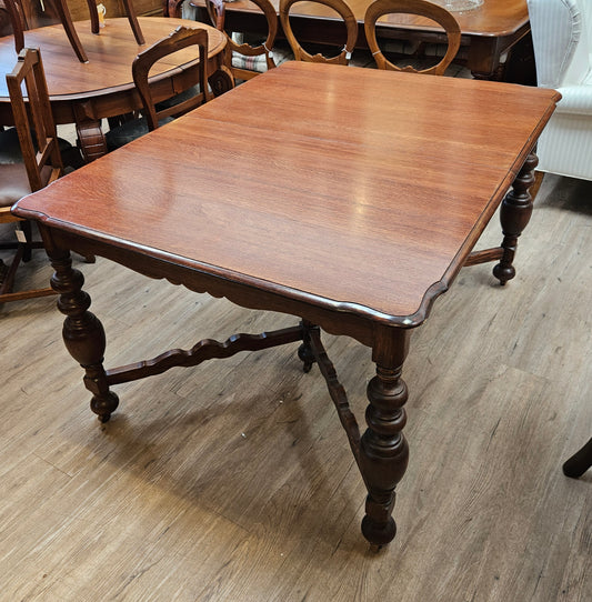Oak/chestnut dining table with one leaf