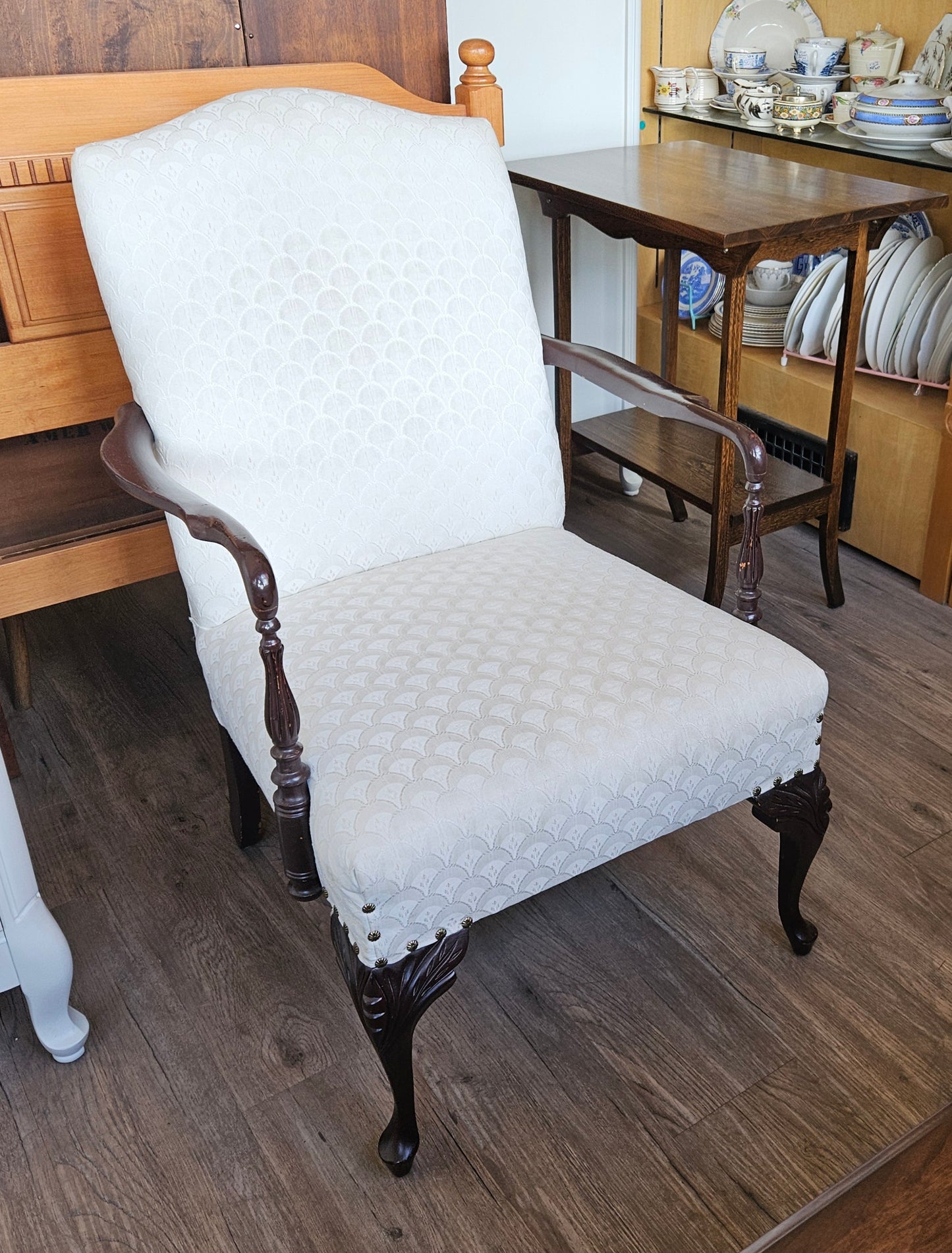 White upholstered arm chair