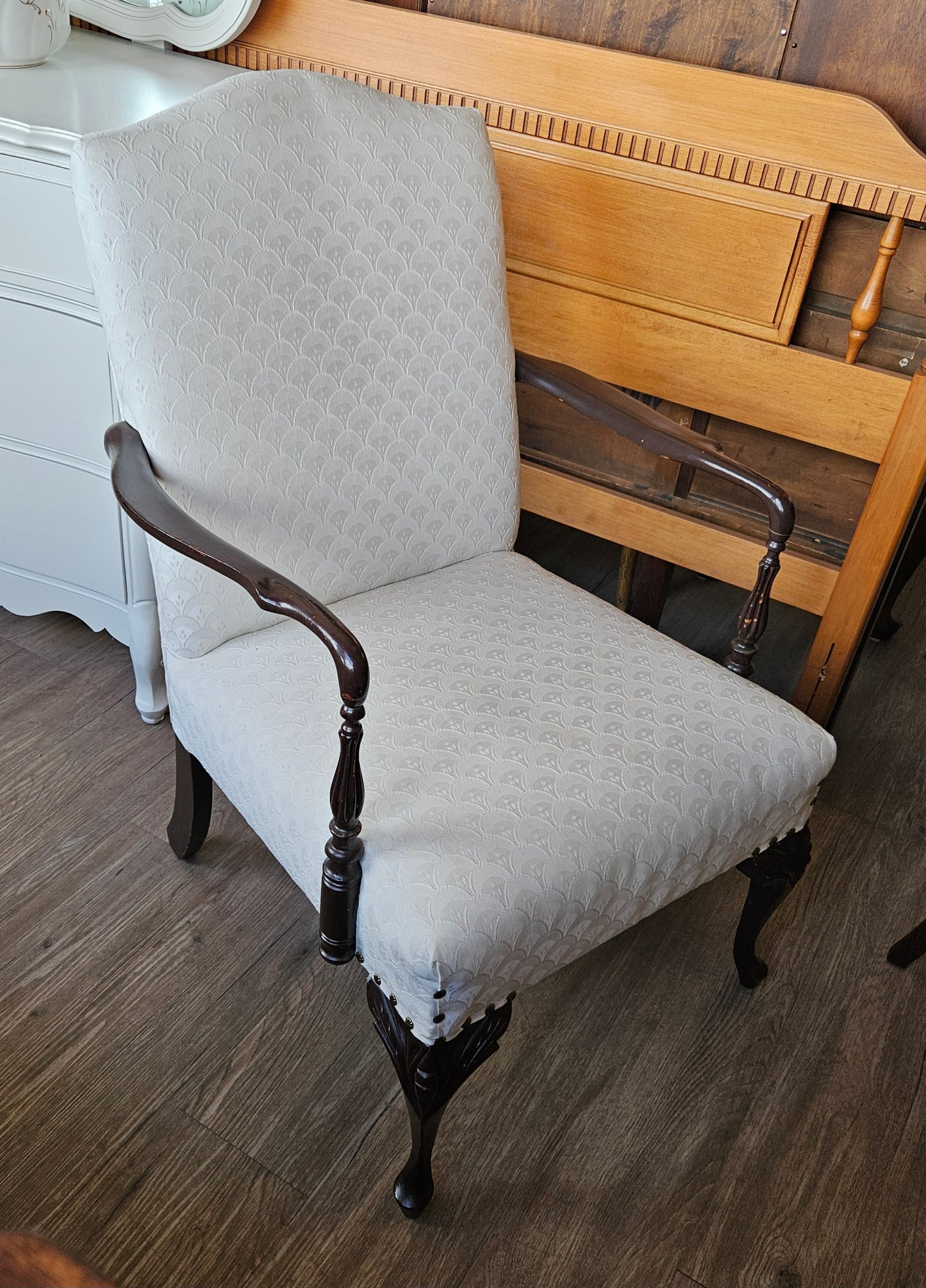 White upholstered arm chair