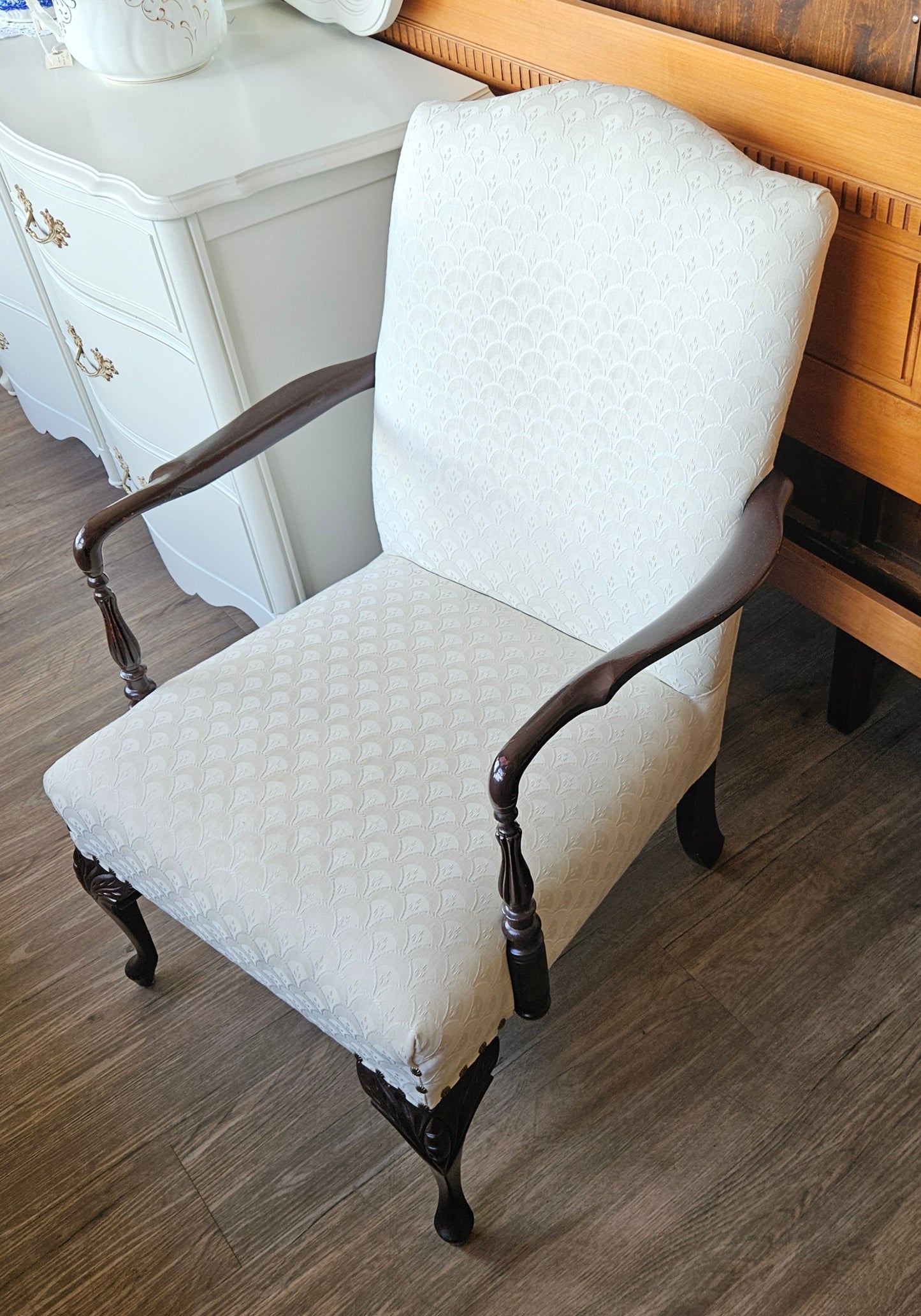 White upholstered arm chair