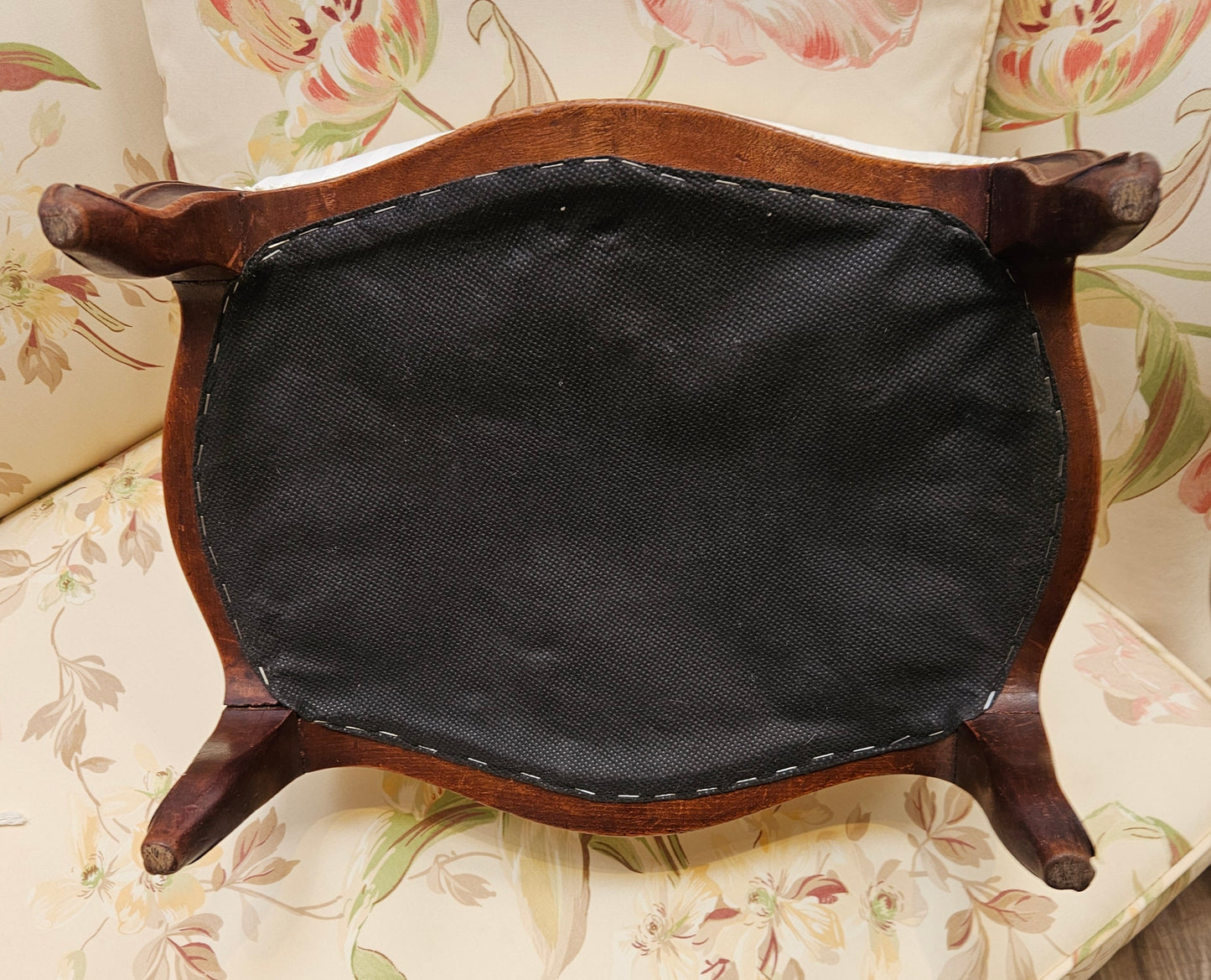 White upholstered foot stool