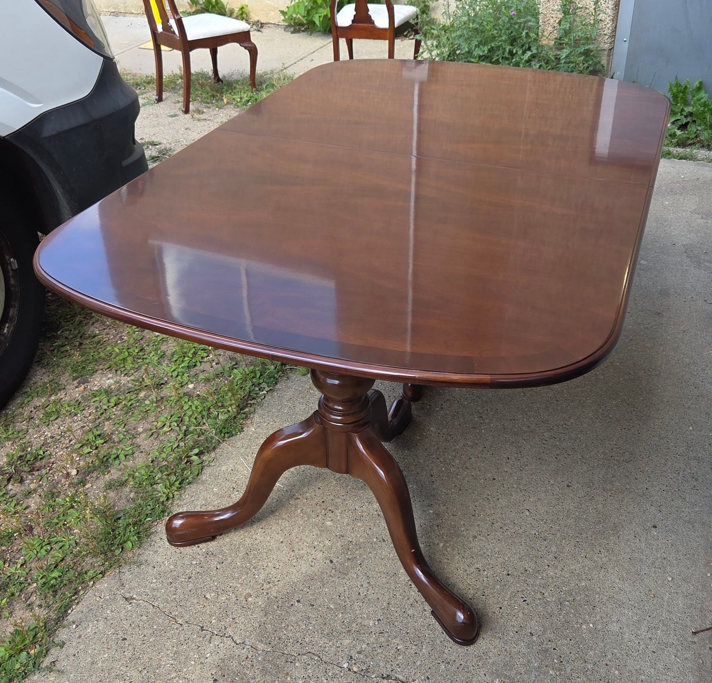 Strathroy dining table with 3 leaves, 8 chairs