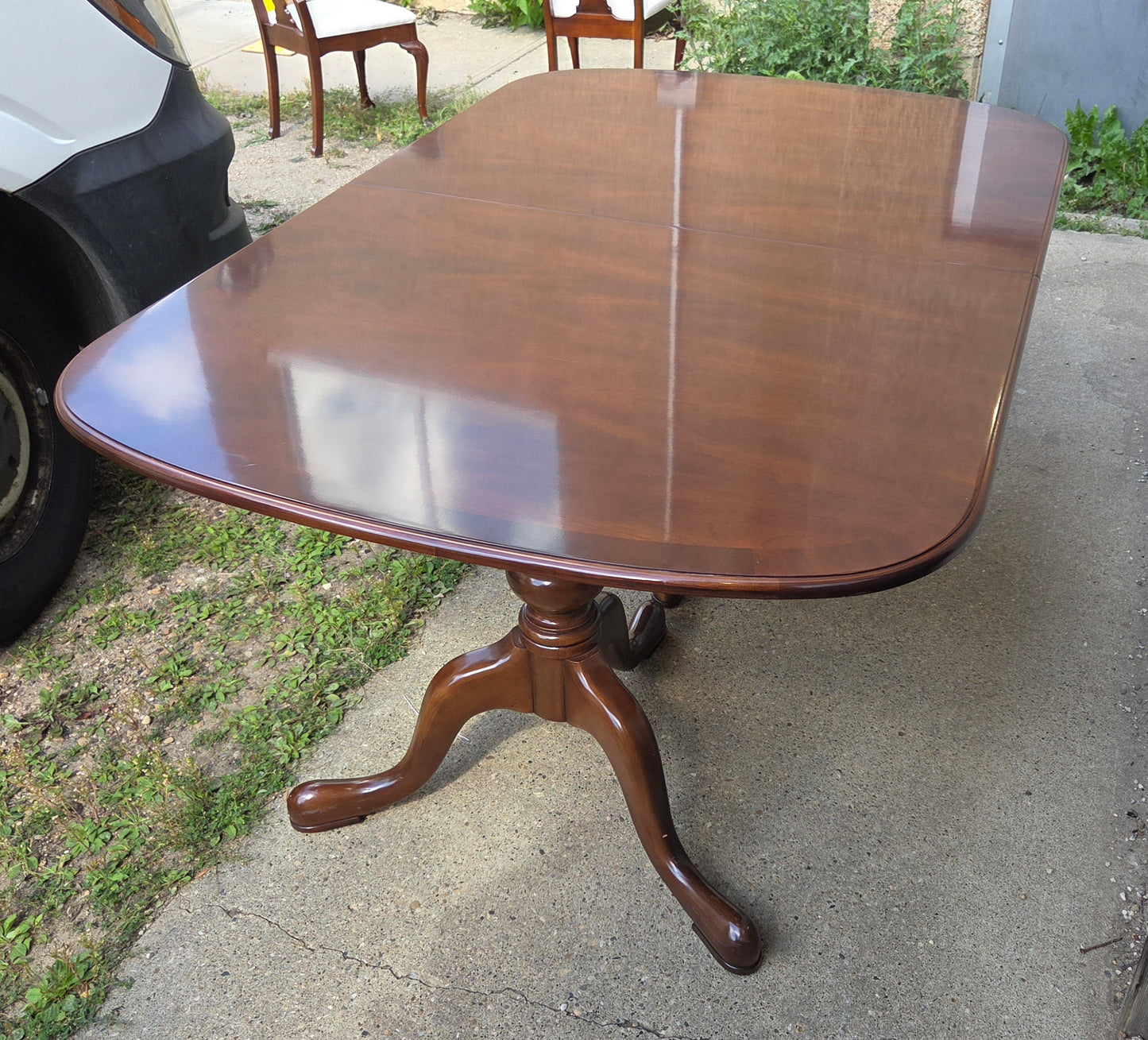 Strathroy dining table with 3 leaves, 8 chairs