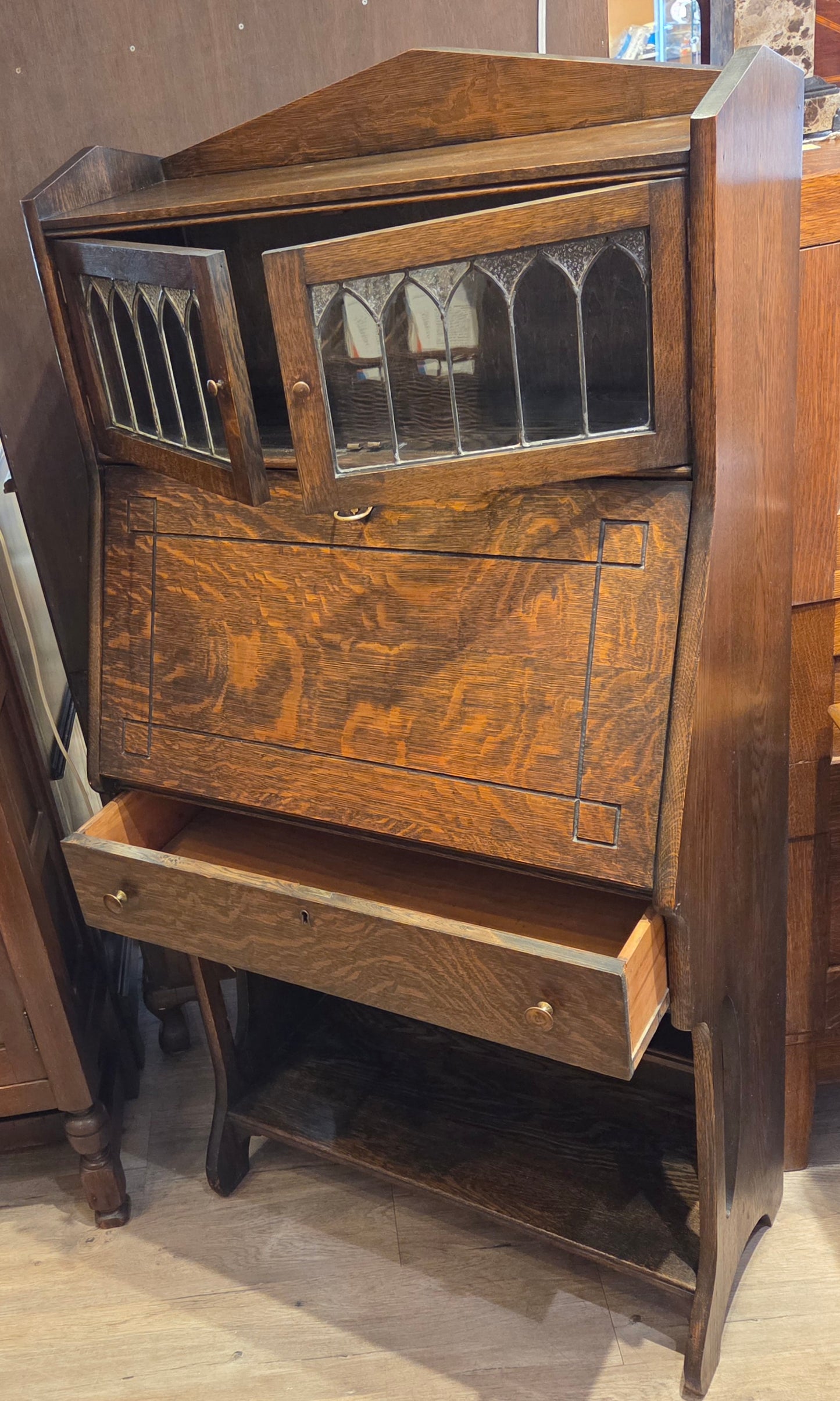 High back dark tiger oak drop-front desk