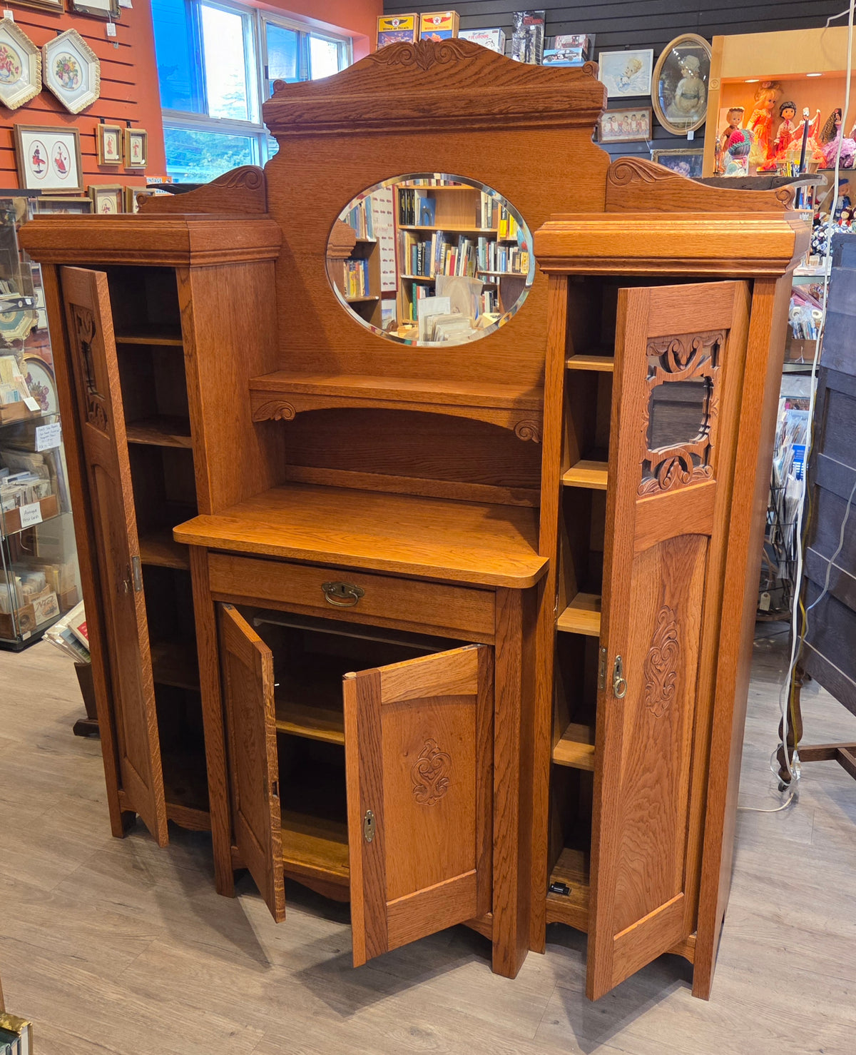 Break-front oak cabinet/entrance piece