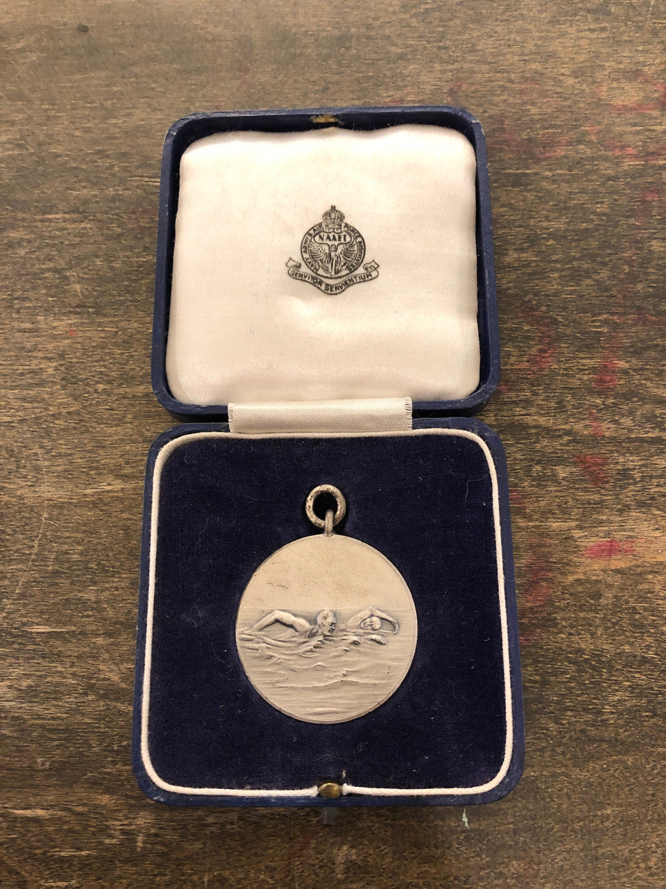 Navy, Army & Airforce Institutes vintage sterling silver swimmer medallion, case