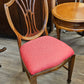 Pink/red upholstered shield chair
