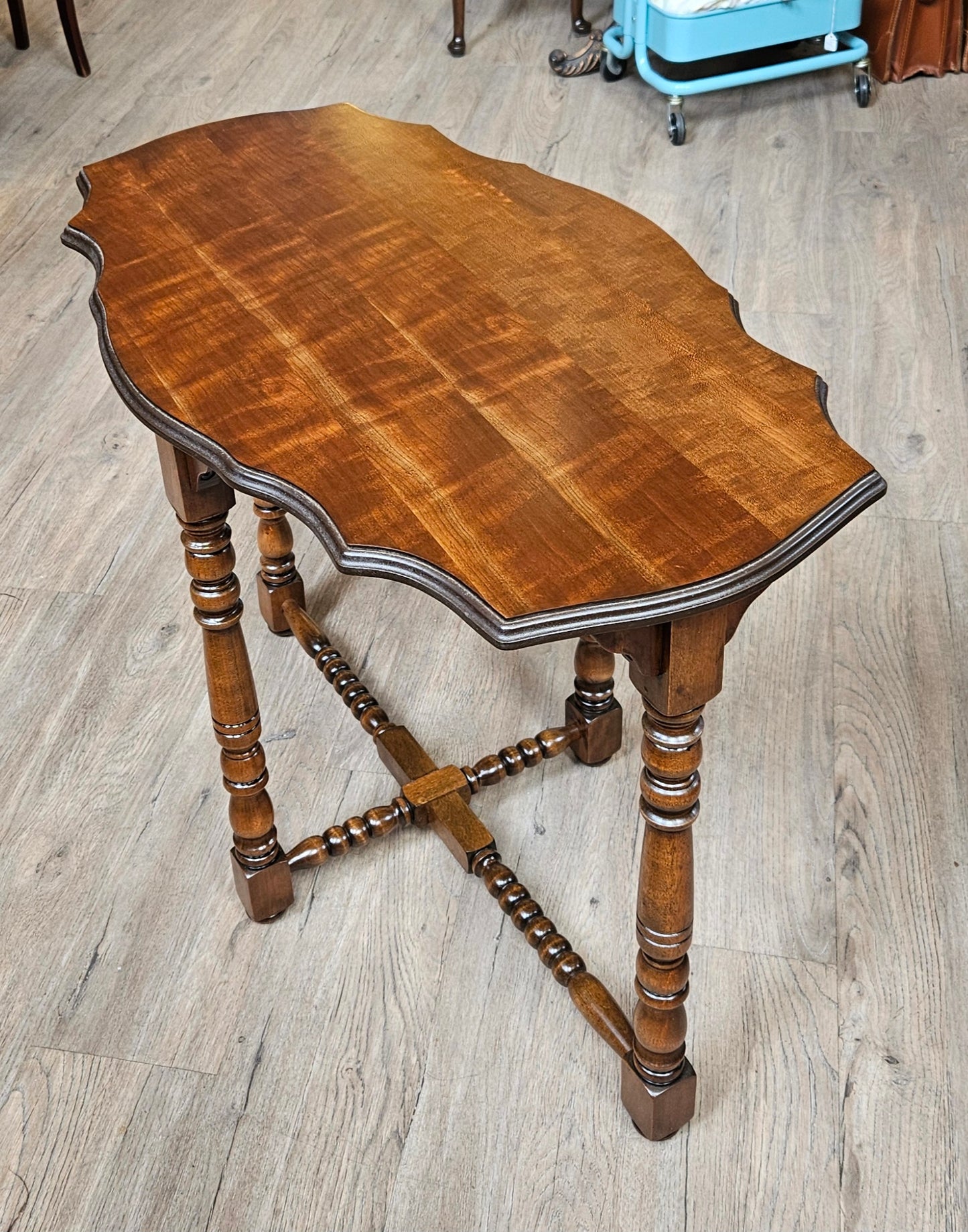 Oval sofa table, scalloped edges