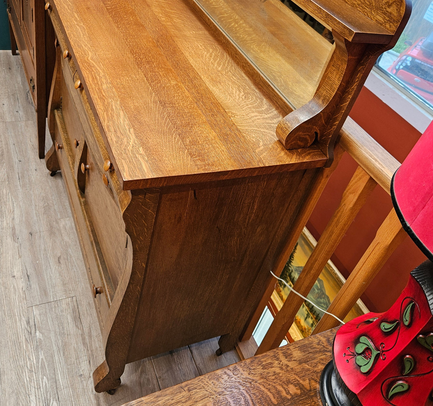 Oak sideboard with mirrored backsplash