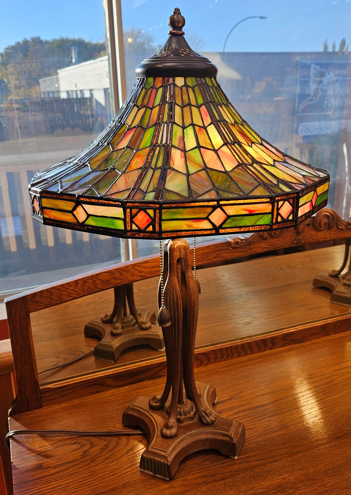 Pair of Tiffany style stained glass table lamps, octagonal shades