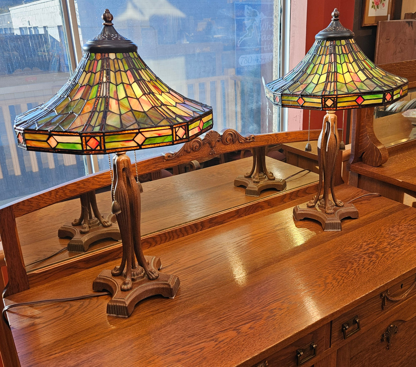 Pair of Tiffany style stained glass table lamps, octagonal shades