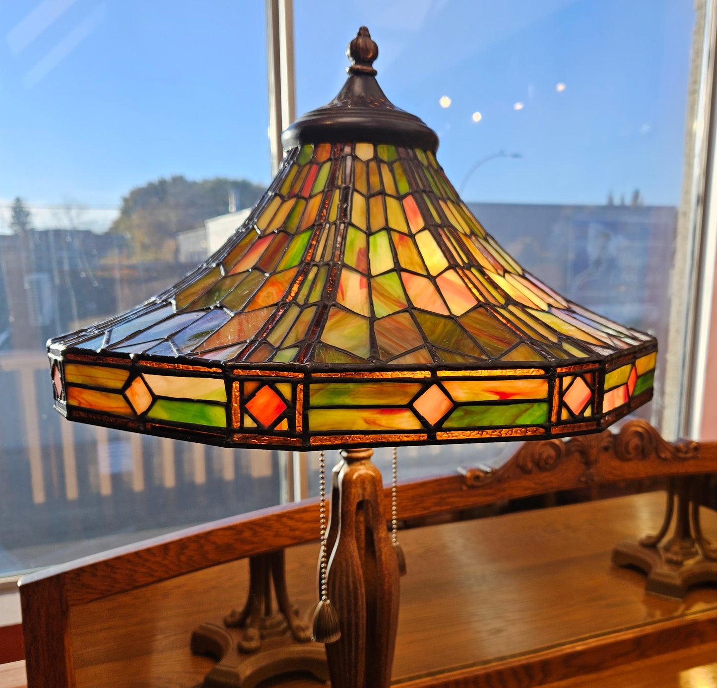 Pair of Tiffany style stained glass table lamps, octagonal shades