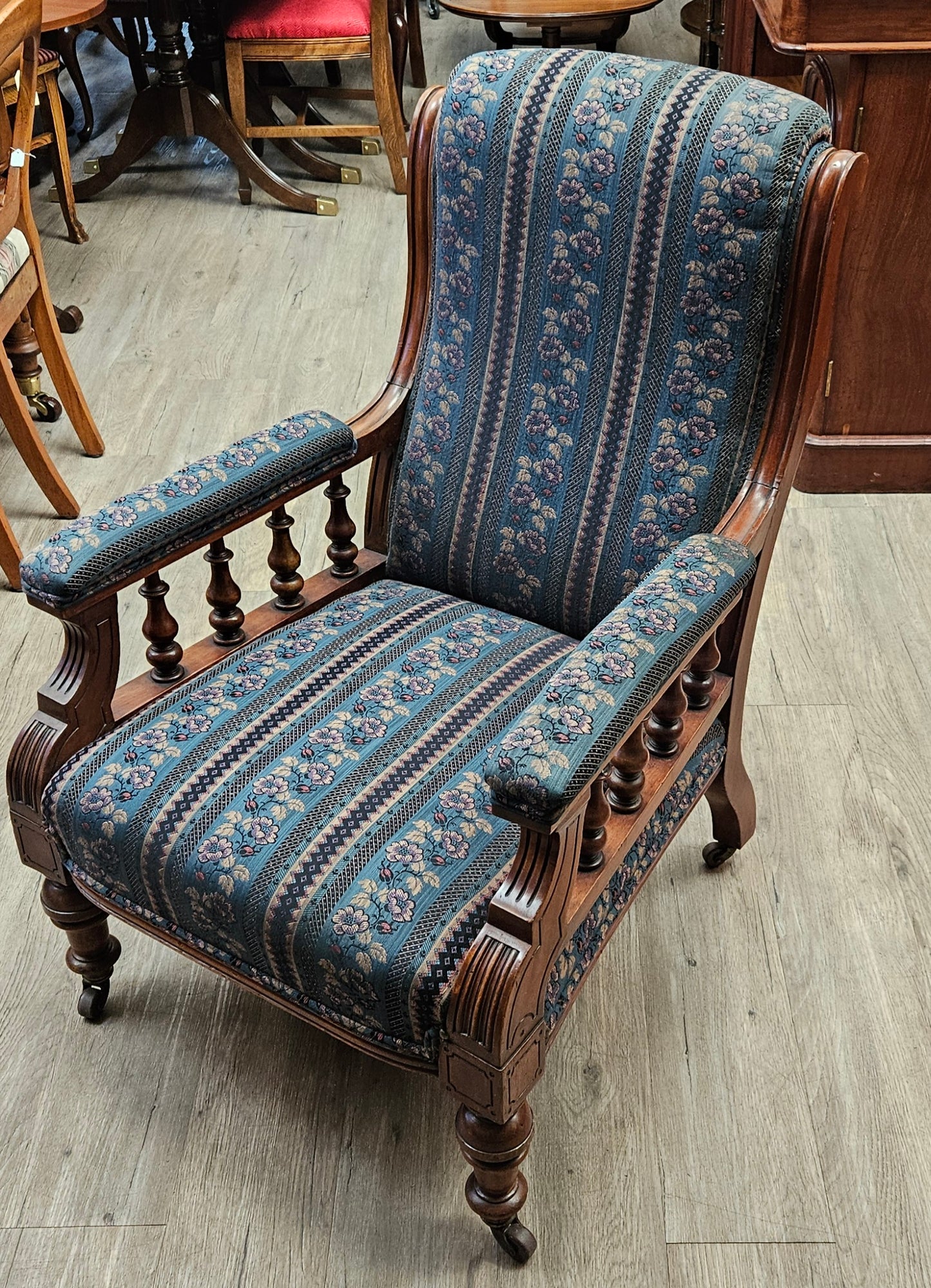 Pair of Victorian chairs on wheels, dark green striped upholstery