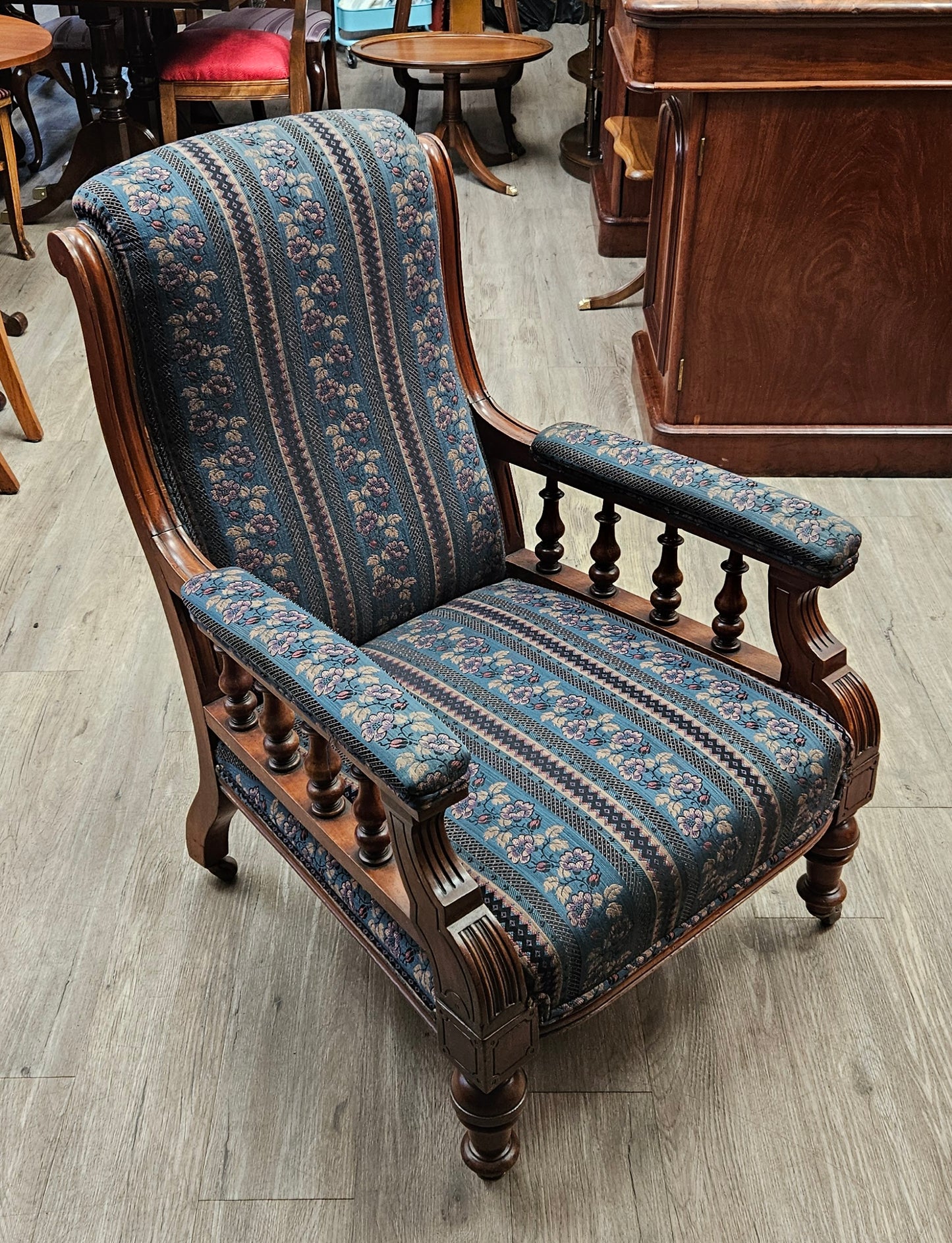 Pair of Victorian chairs on wheels, dark green striped upholstery