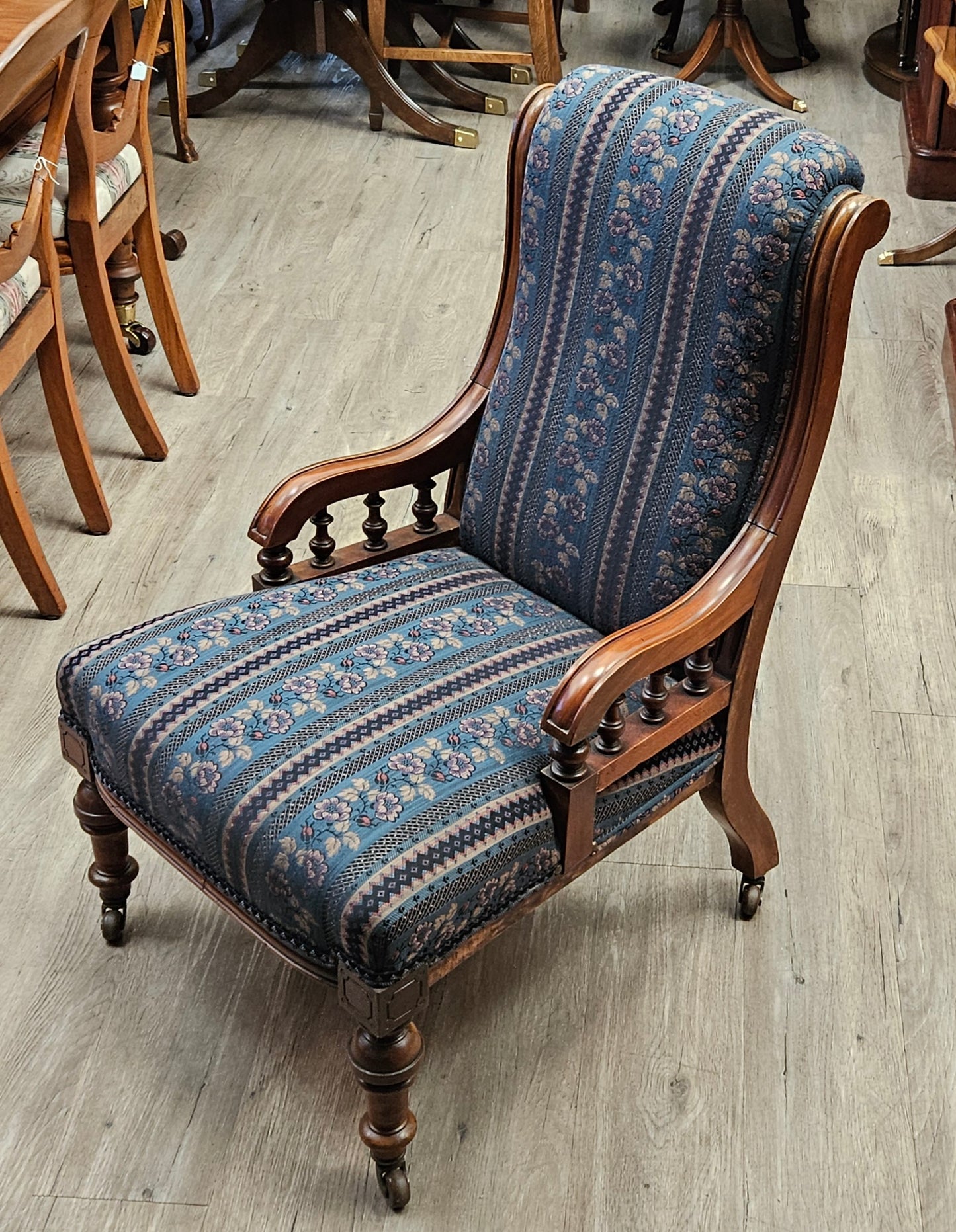 Pair of Victorian chairs on wheels, dark green striped upholstery