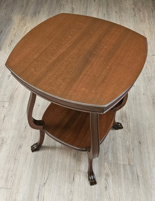 Squarish parlour table with shelf