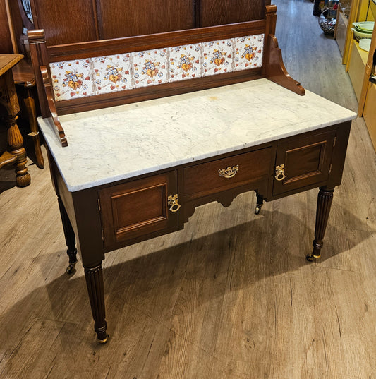 Antique marble top washstand with drawers and backsplash