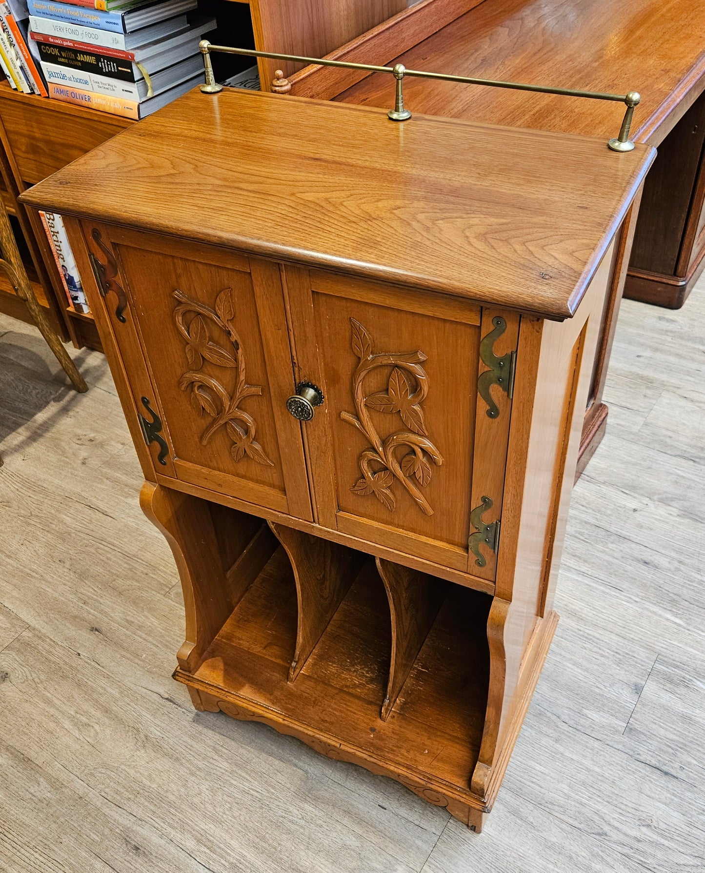 Music cabinet with back rail