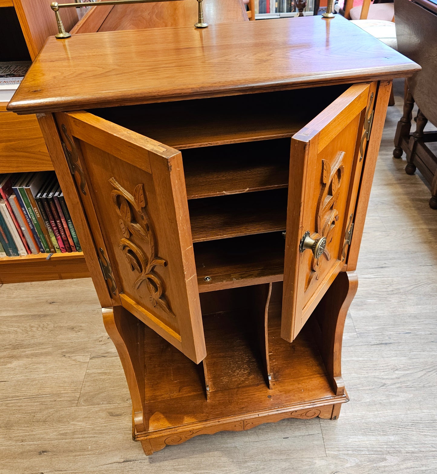 Music cabinet with back rail