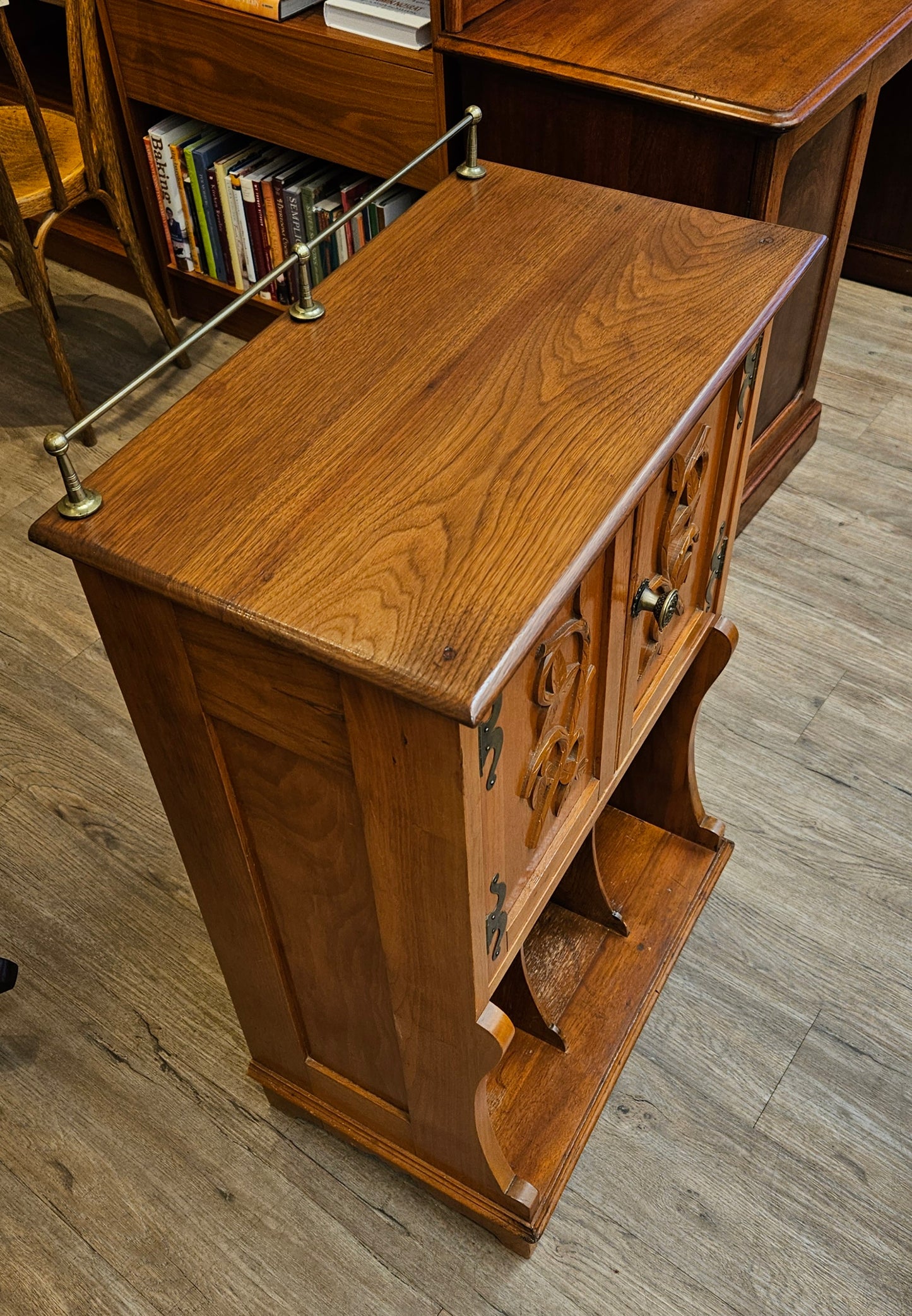 Music cabinet with back rail