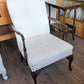 White upholstered arm chair