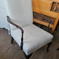 White upholstered arm chair
