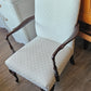 White upholstered arm chair