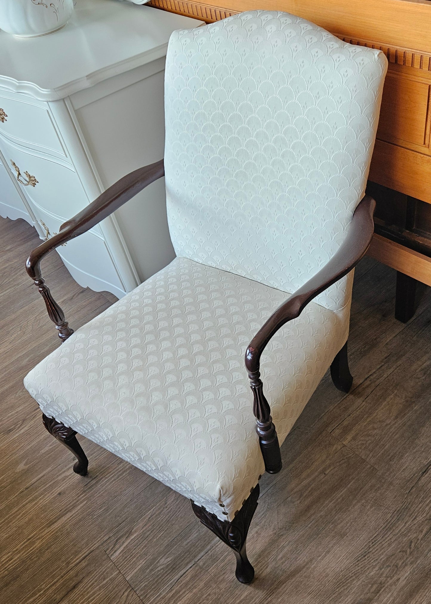 White upholstered arm chair