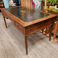 Large desk with drawers , tooled leather top, Louis XVI style