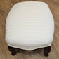 White upholstered foot stool