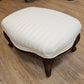 White upholstered foot stool