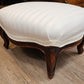 White upholstered foot stool