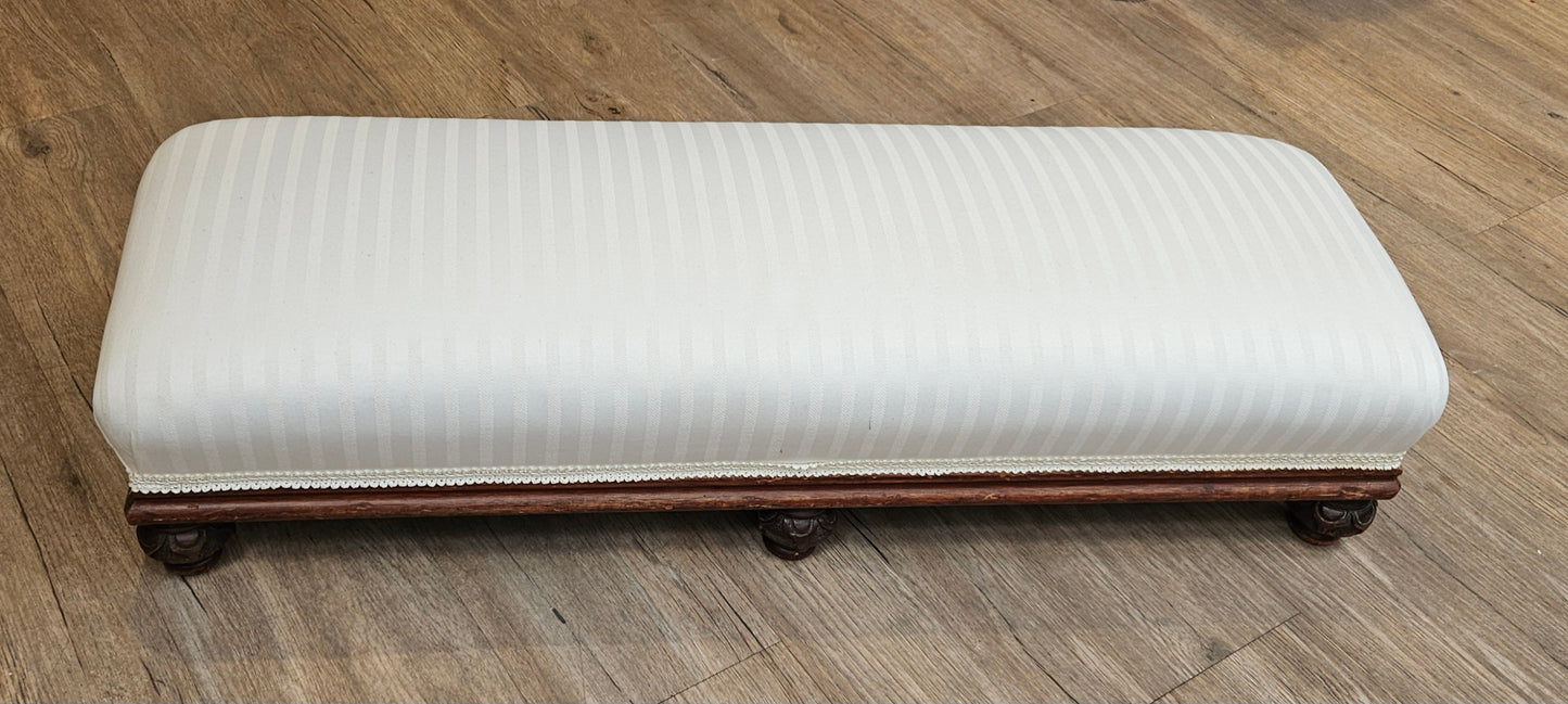 Low white upholstered fireside bench