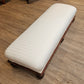 Low white upholstered fireside bench