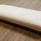 Low white upholstered fireside bench