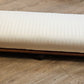 Low white upholstered fireside bench