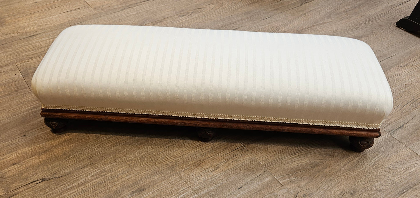 Low white upholstered fireside bench