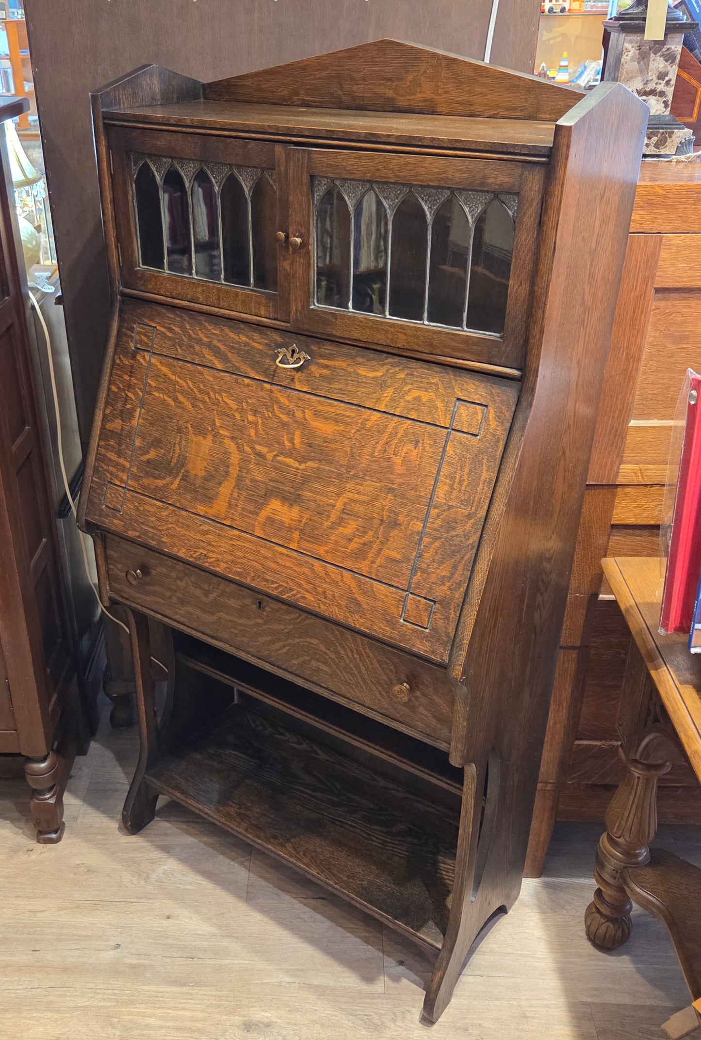 High back dark tiger oak drop-front desk