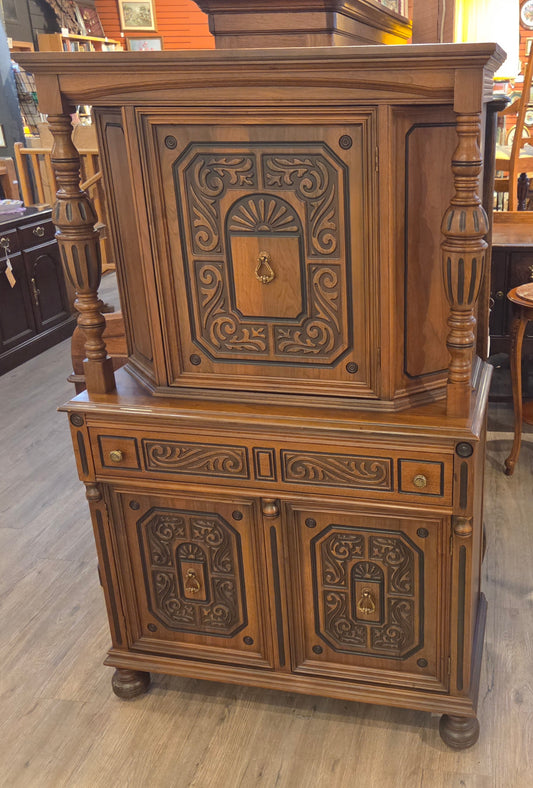 Walnut china cabinet, carved wood decorations on doors