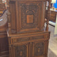 Walnut china cabinet, carved wood decorations on doors