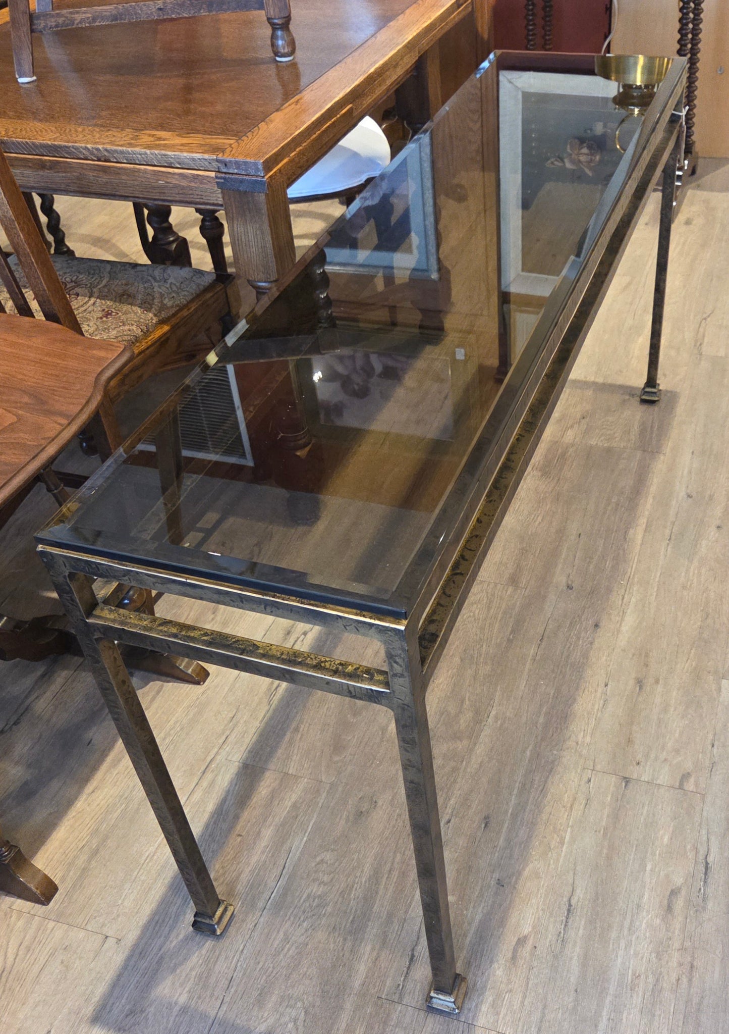 Sofa table, bronzed iron frame, bevelled glass top