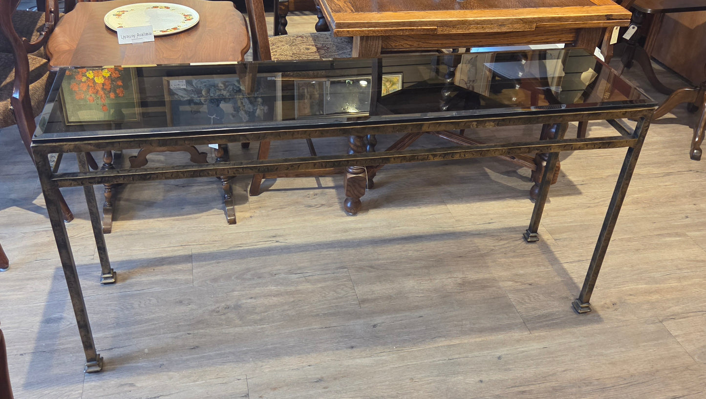 Sofa table, bronzed iron frame, bevelled glass top