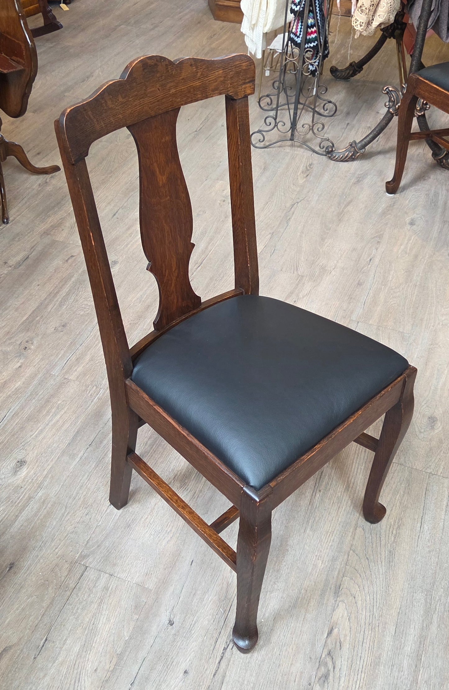 Set of 6 oak dining chairs, black leather seats