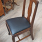 Set of 6 oak dining chairs, black leather seats
