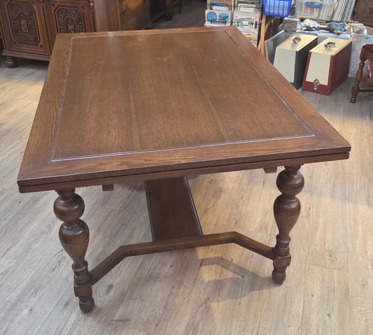 Oak draw-leaf dining table