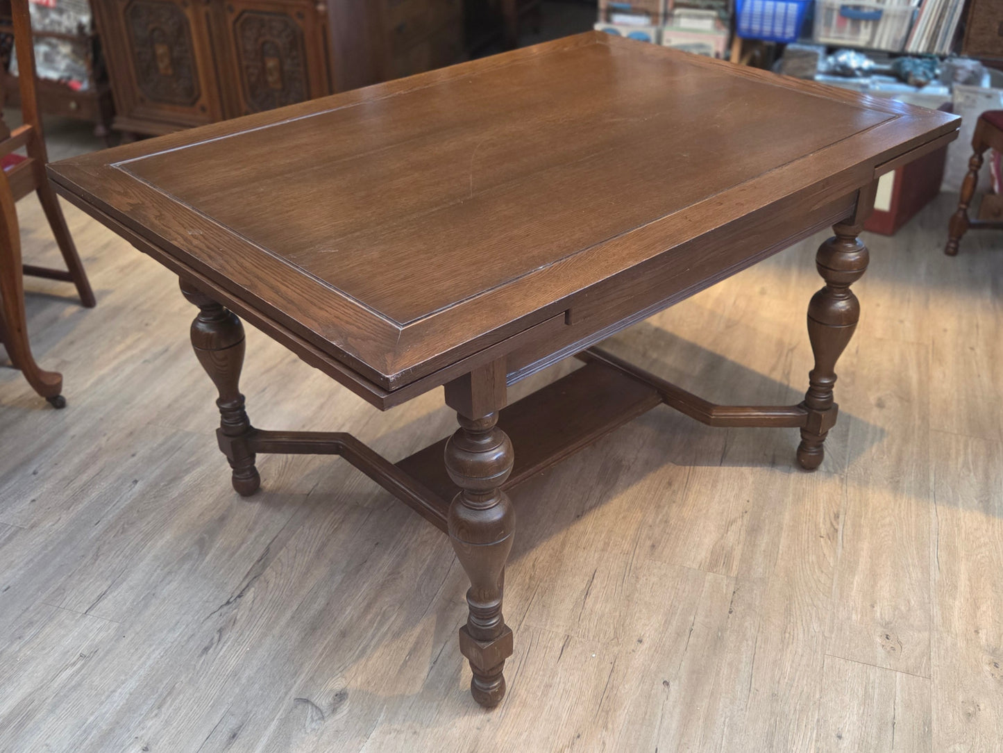 Oak draw-leaf dining table